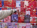 Quand Une Carte De Vœux Chaton-Père Noël Se Transforme En destiné Chanson De Noel En Chinois