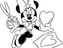 Coloriage - Minnie Découpe Un Cœur | Le Journal De Mickey intérieur Dessin Minnie À Imprimer